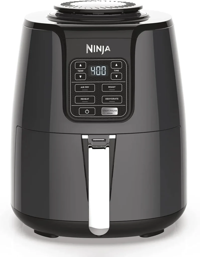 Ninja AF101 air fryer under $100 with crispy food in basket showing excellent cooking results